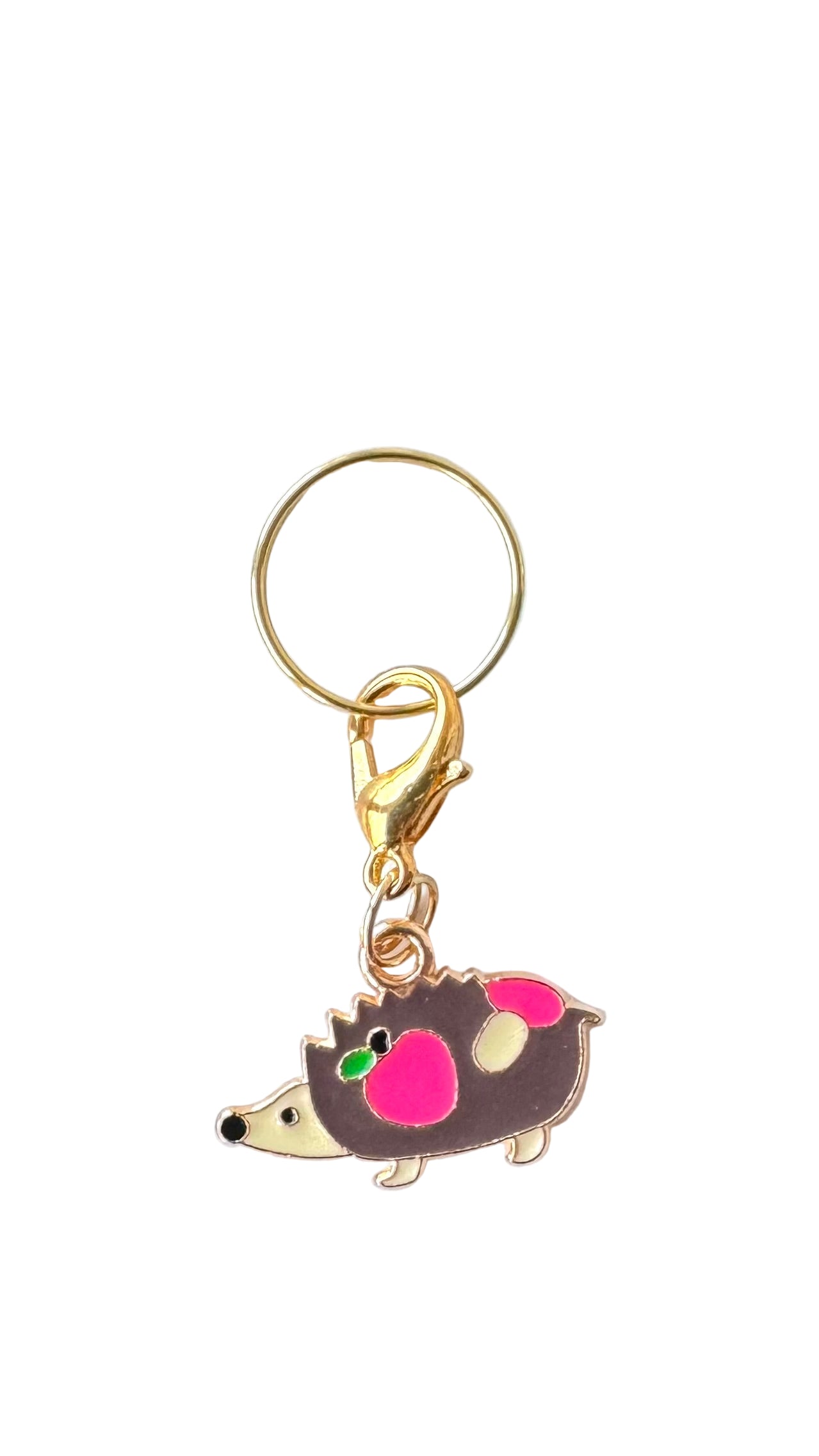 Hedgehog-shaped charm with white background