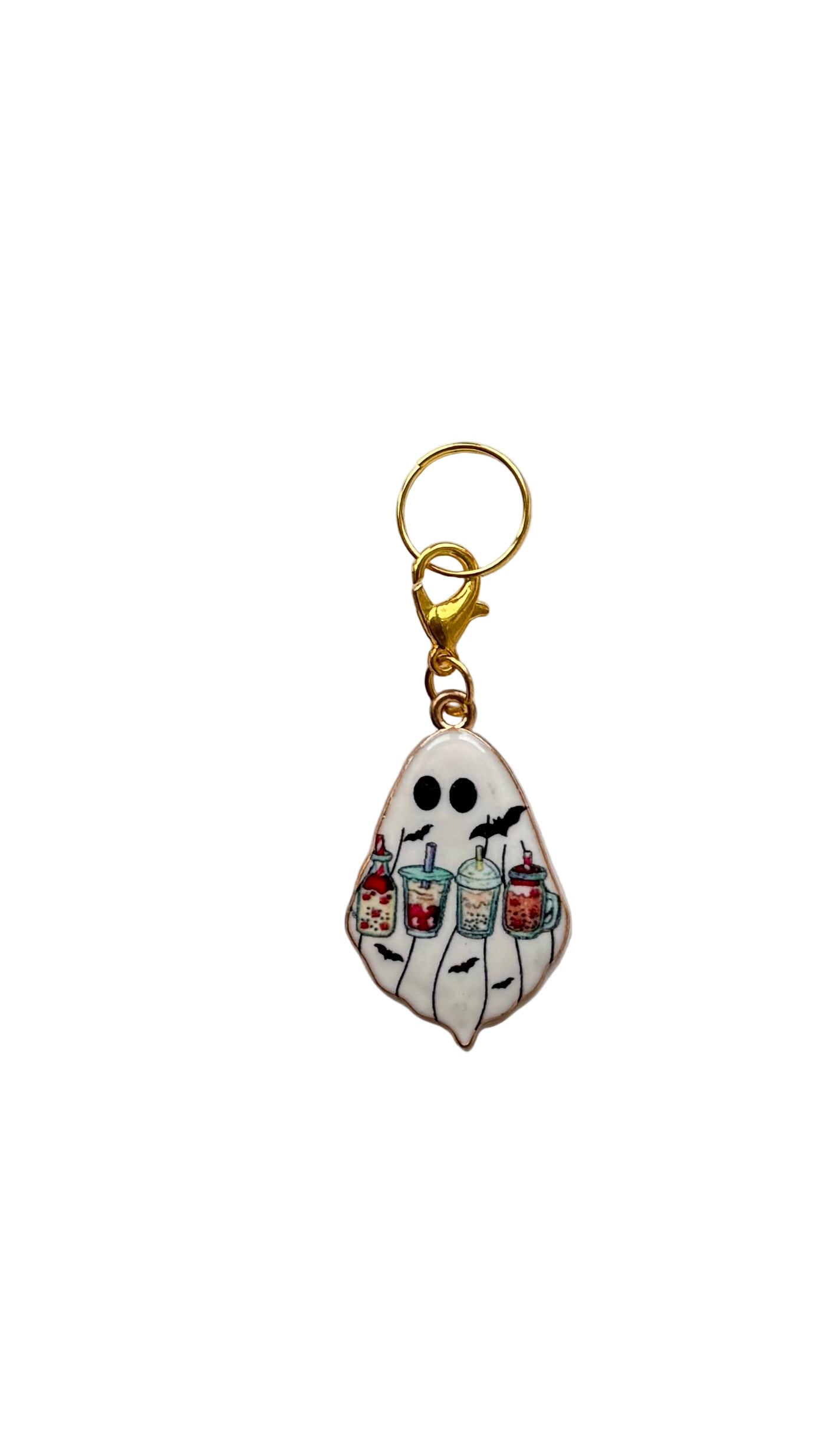 Ghost keychain with colorful details on a white background