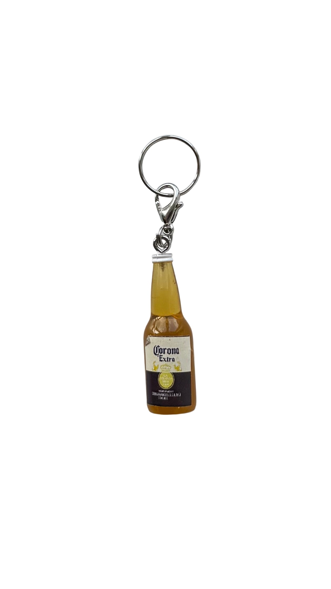 Corona beer bottle charm on a white background