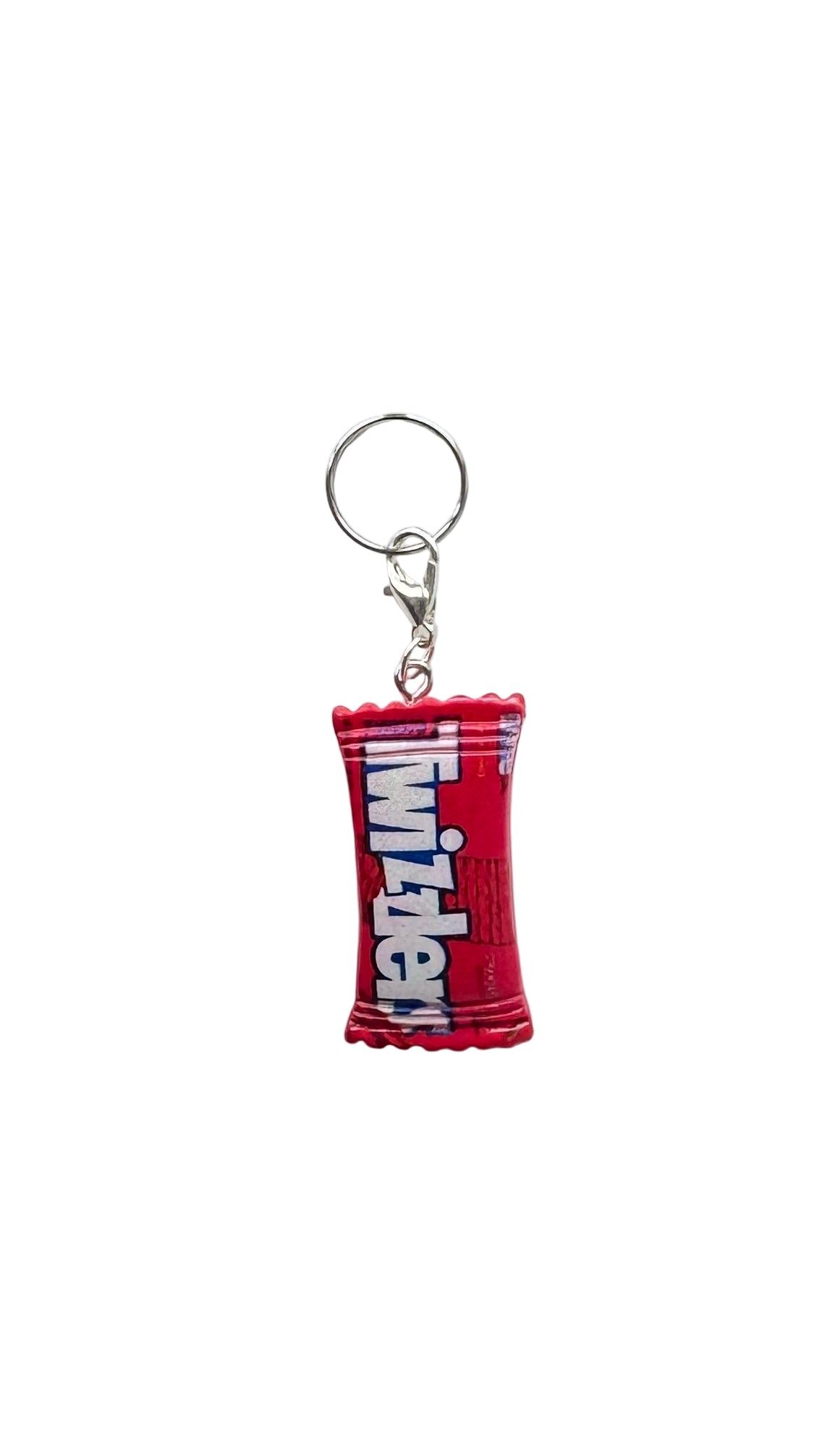 Red Twizzlers charm on a white background
