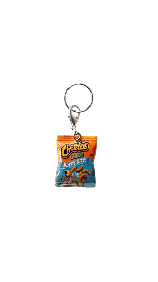 Cheetos charm on a white background