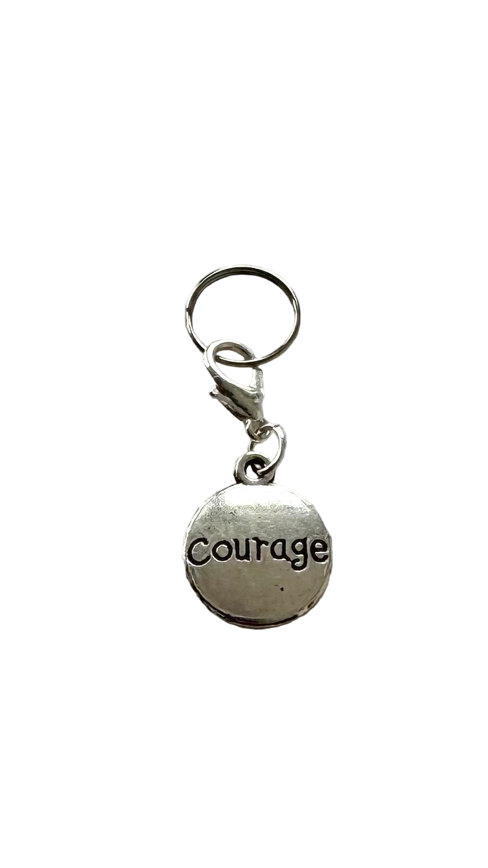 Silver keychain with 'Courage' charm on a white background