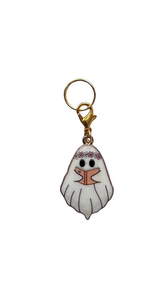 Charm with a cartoon character design on a white background