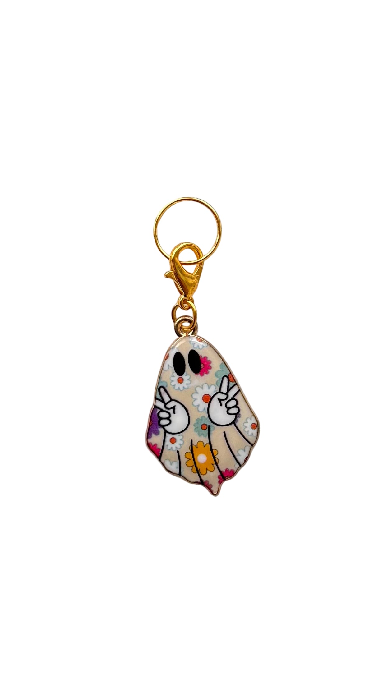 Decorative ghost  charm with cartoon design on a plain background