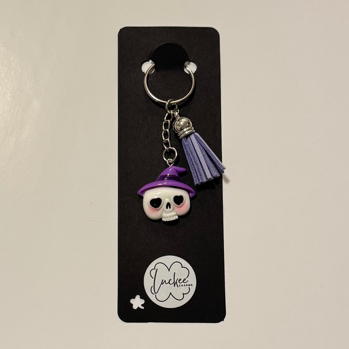 Skull with purple tassel