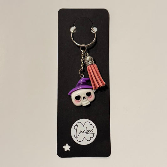 Skull with pink tassel