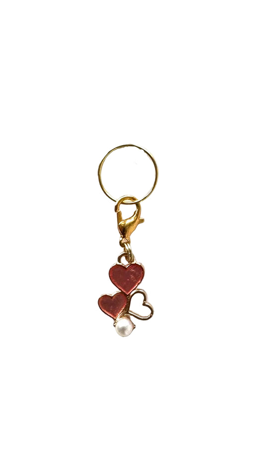 Pink hearts with a pearl