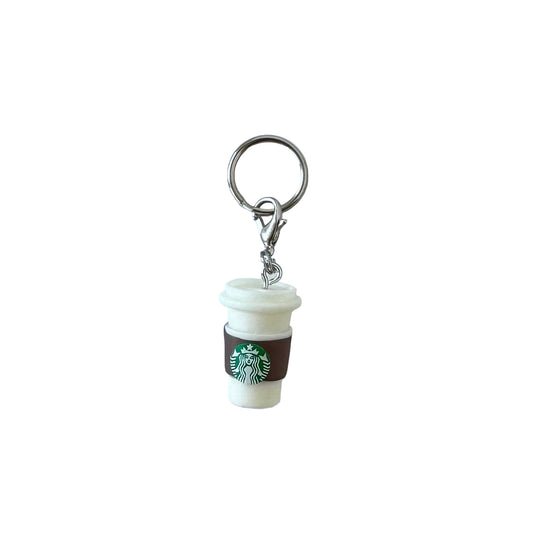Starbucks coffee cup with cardboard band